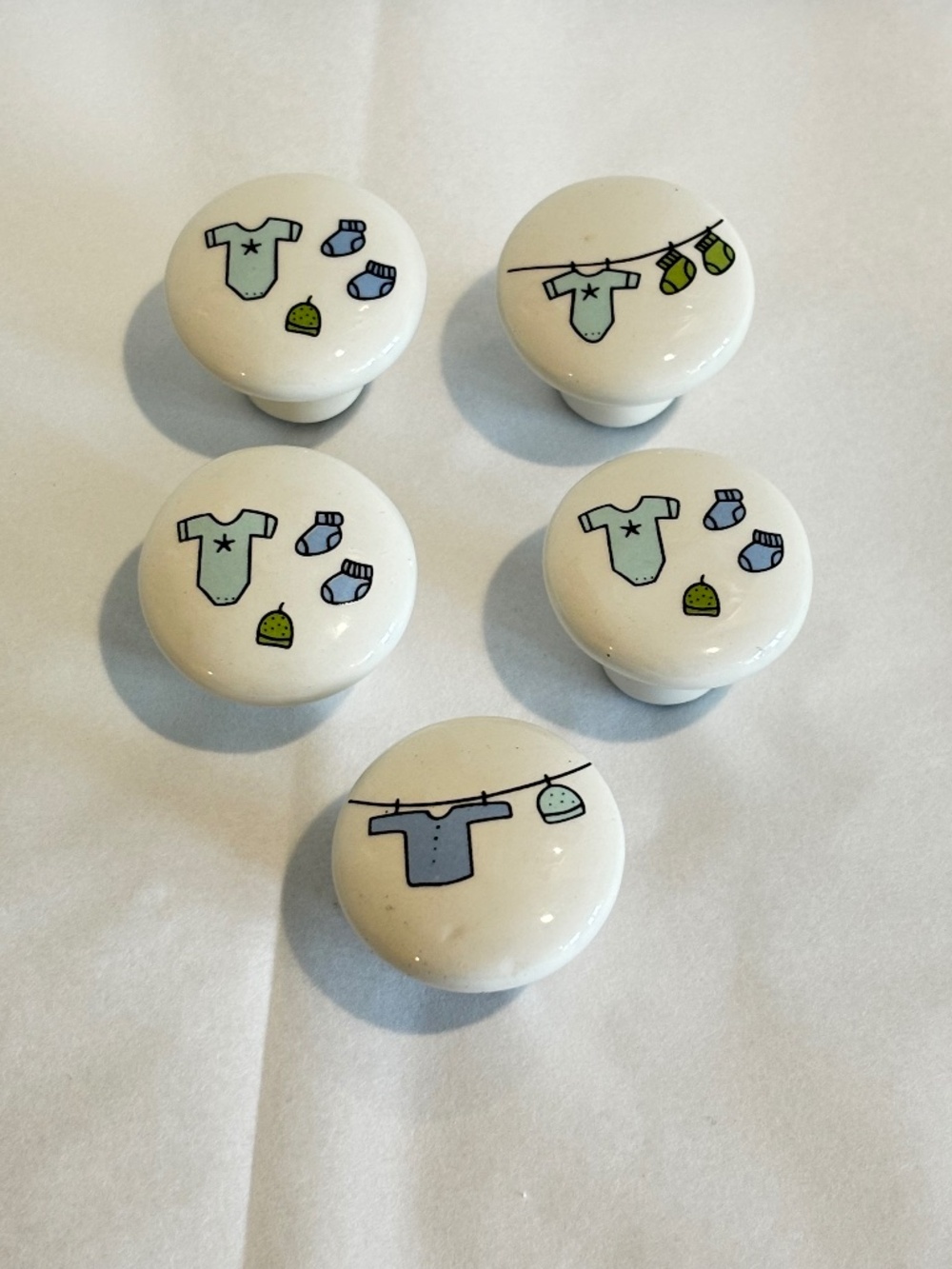 Ceramic porcelain knobs SET OF FIVE whimsical illustrations of baby clothing